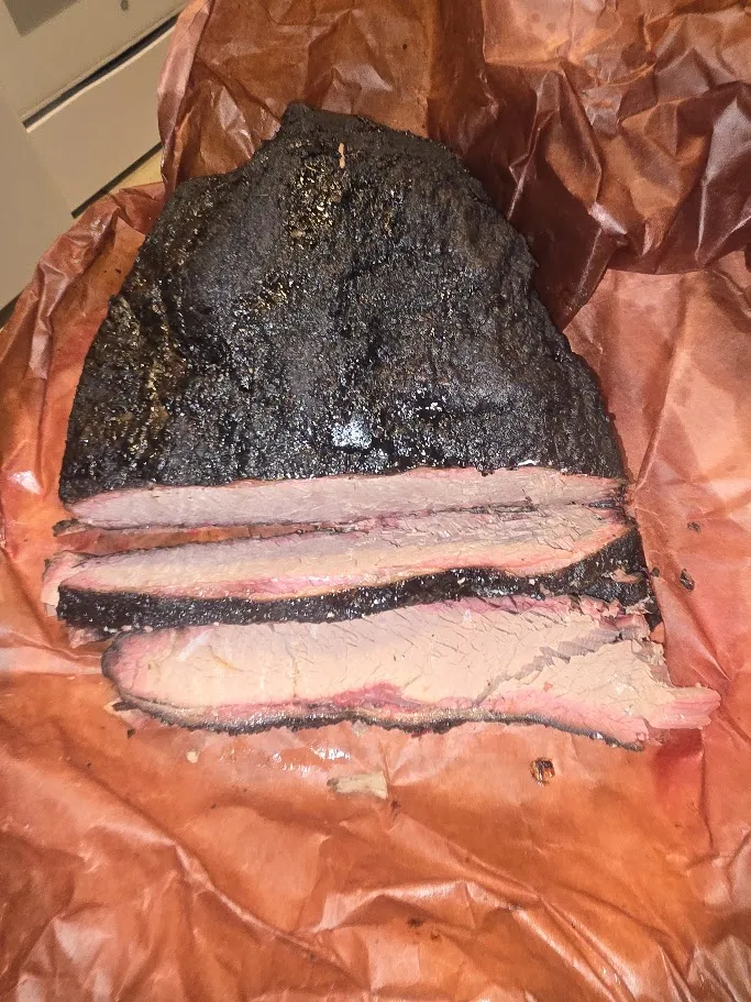 Sliced smoked brisket at Harper's BBQ Houston Heights